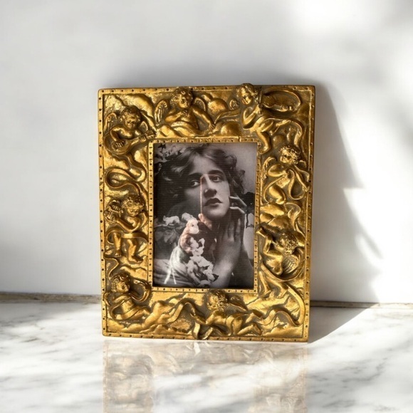 Other - Large gilded Cherub Picture Frame holds 5”x7”. Rare